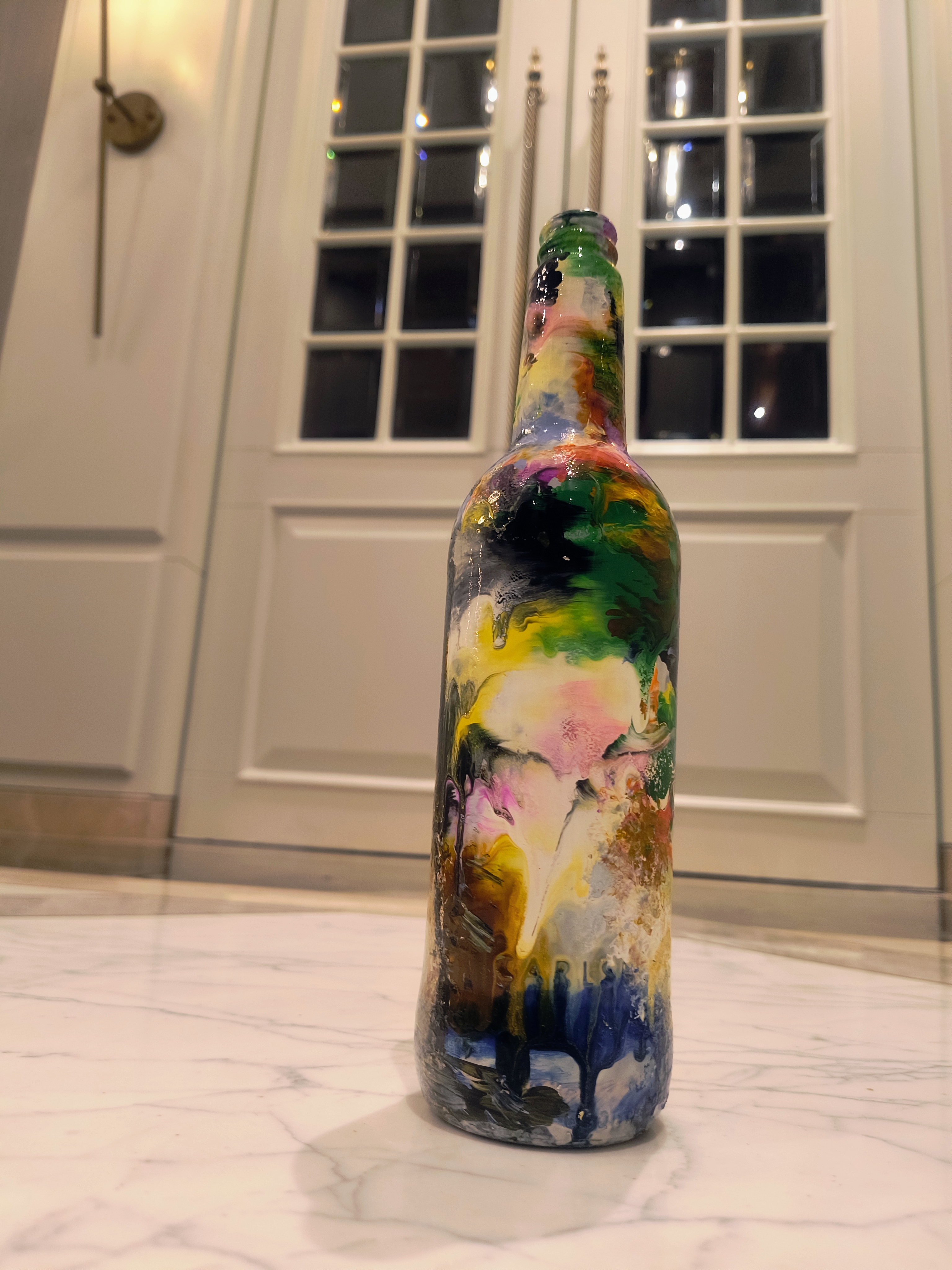 glass-bottle-adorned-with-abstract-textured-art-2-2_1716828604.jpg