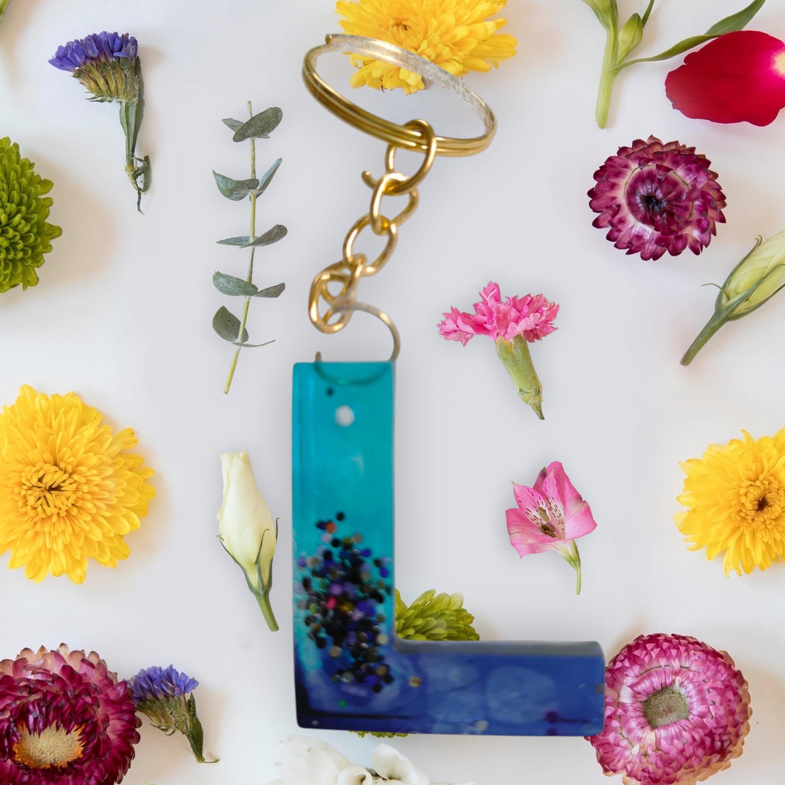 Luminous  "L"  Charm:   Handcrafted Resin Keychain