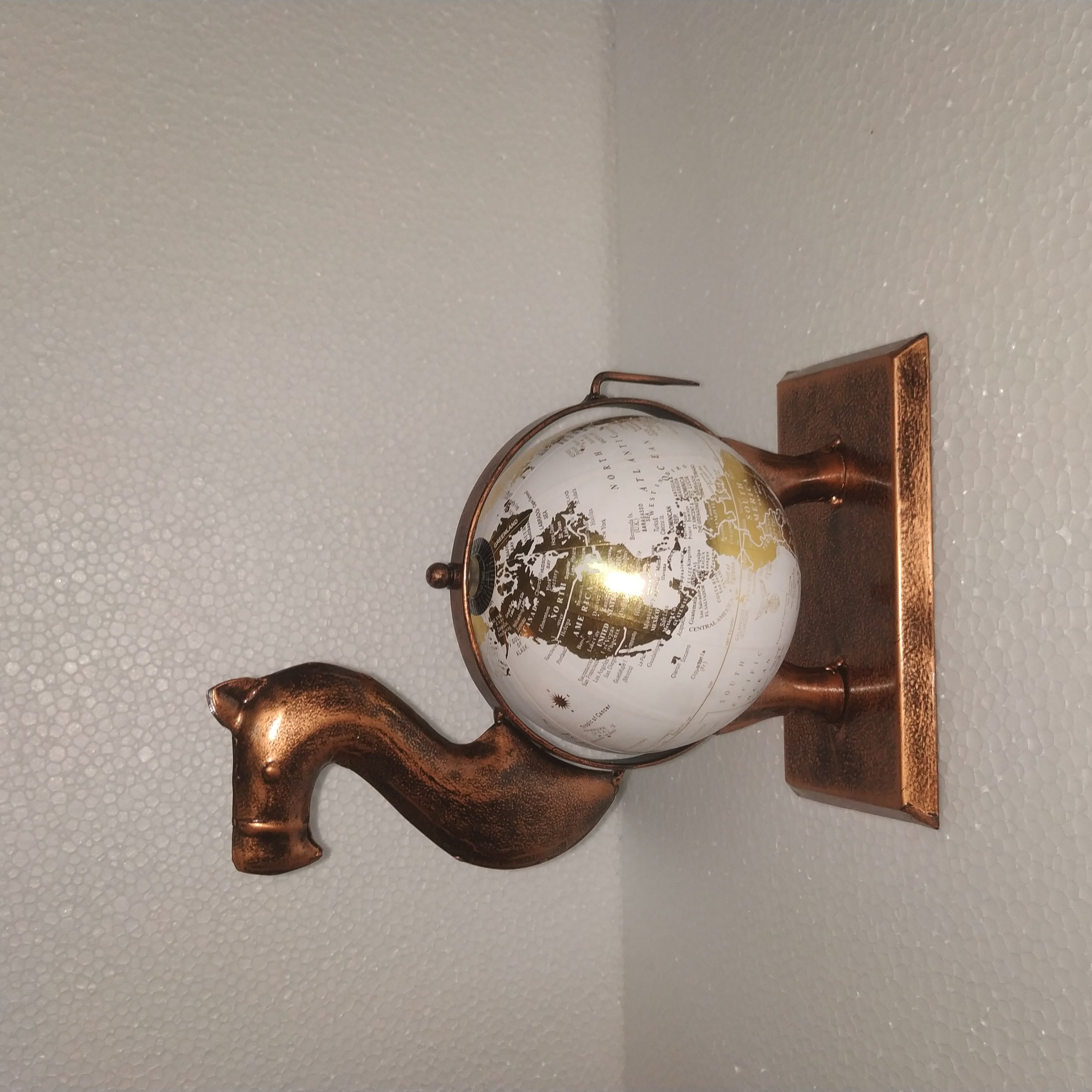 Metal globe in an Animal for table decor / home decor