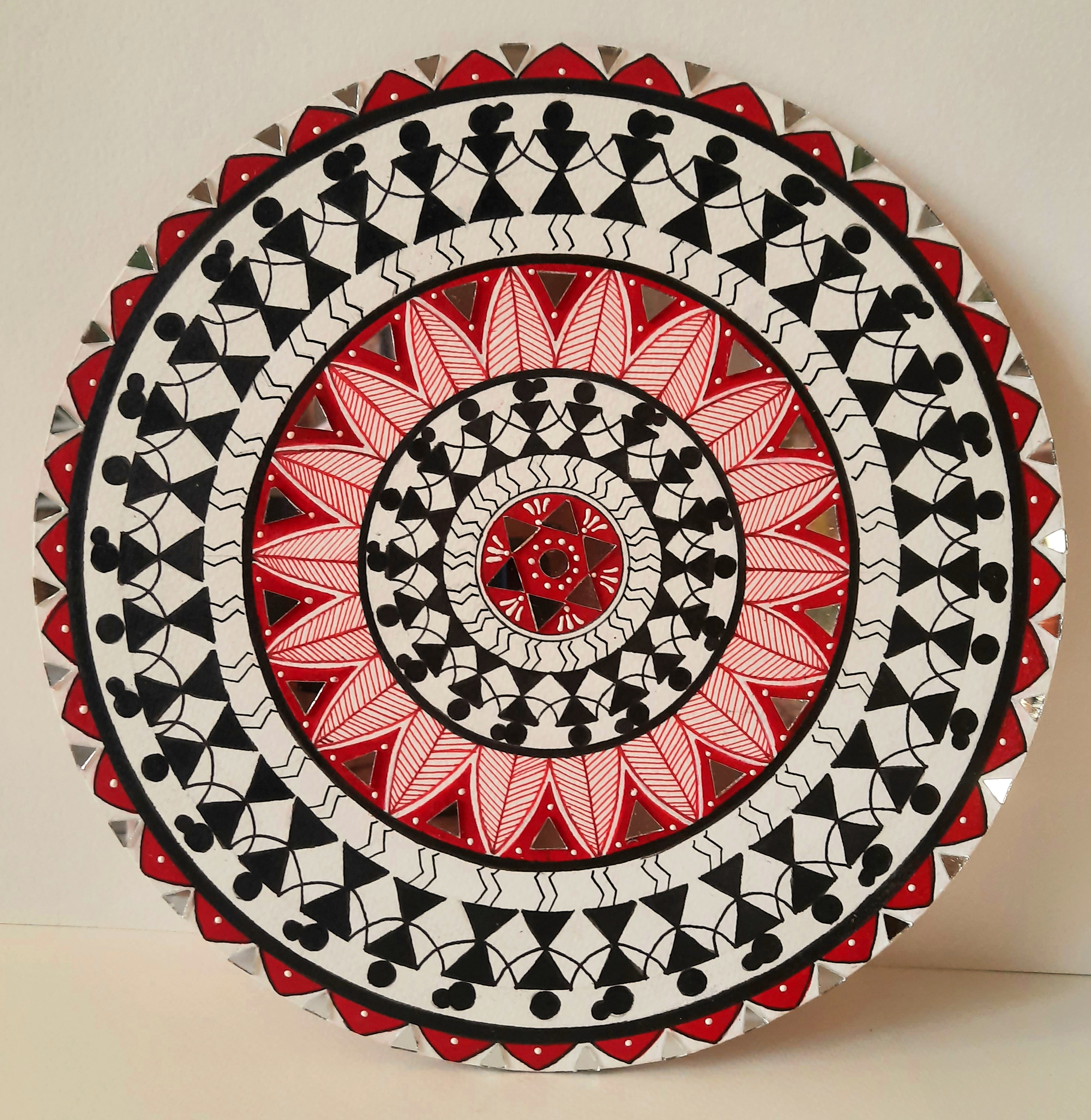Wall plate: Warli painting of Tarpa dance on 10inch round mdf plate